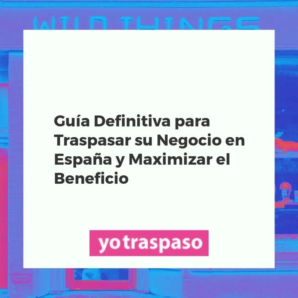 Empresarios negociando el traspaso de un negocio en España, con documentos y herramientas financieras
