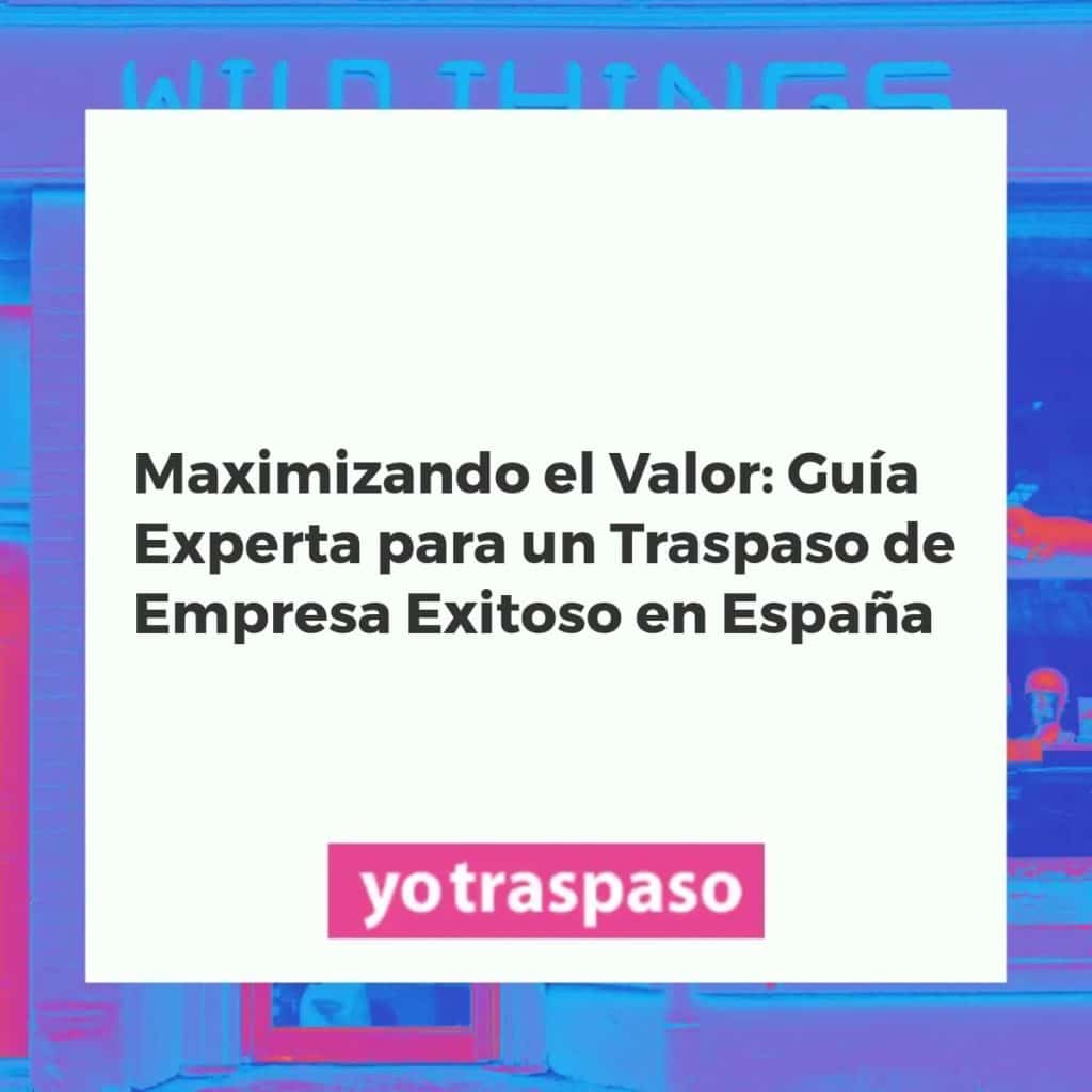 Equipo de empresarios en España cerrando un acuerdo de traspaso exitoso, con gráficos financieros en una tablet